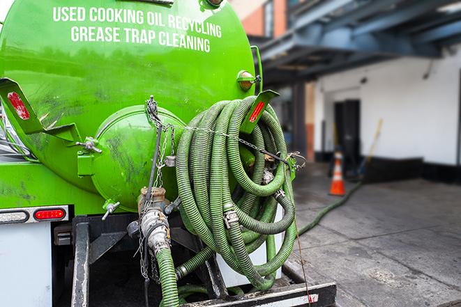 a plumber pumping a grease trap in American Canyon CA